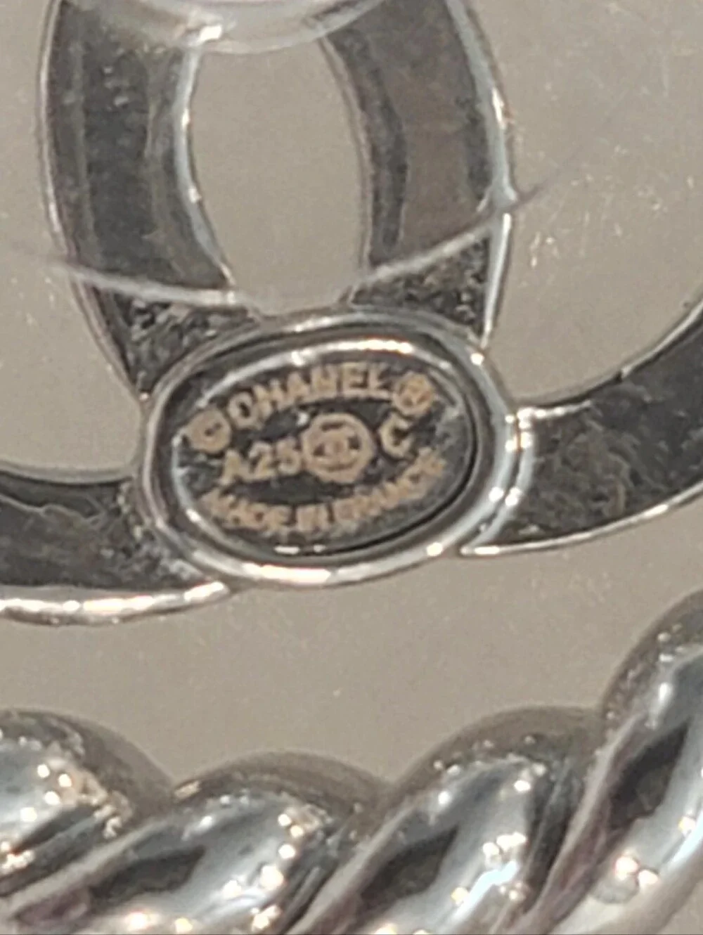 Authentic CHANEL CC Twisted Rope Border Stud Earrings Silver 2025 Cruise A25C